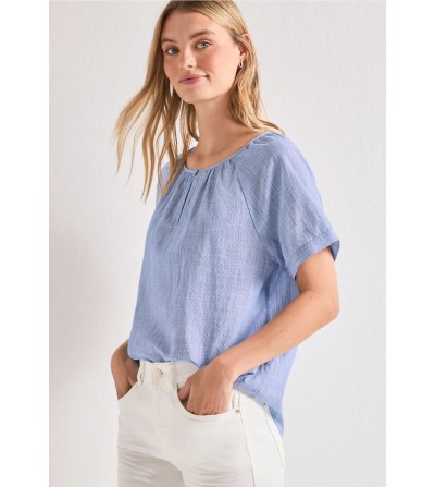 Blusa con cuello redondo y...